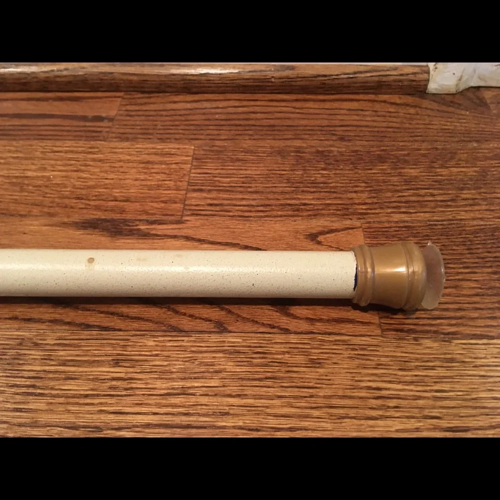 Adjustable tension shower curtain rod with suction cup ends- cream/bronze